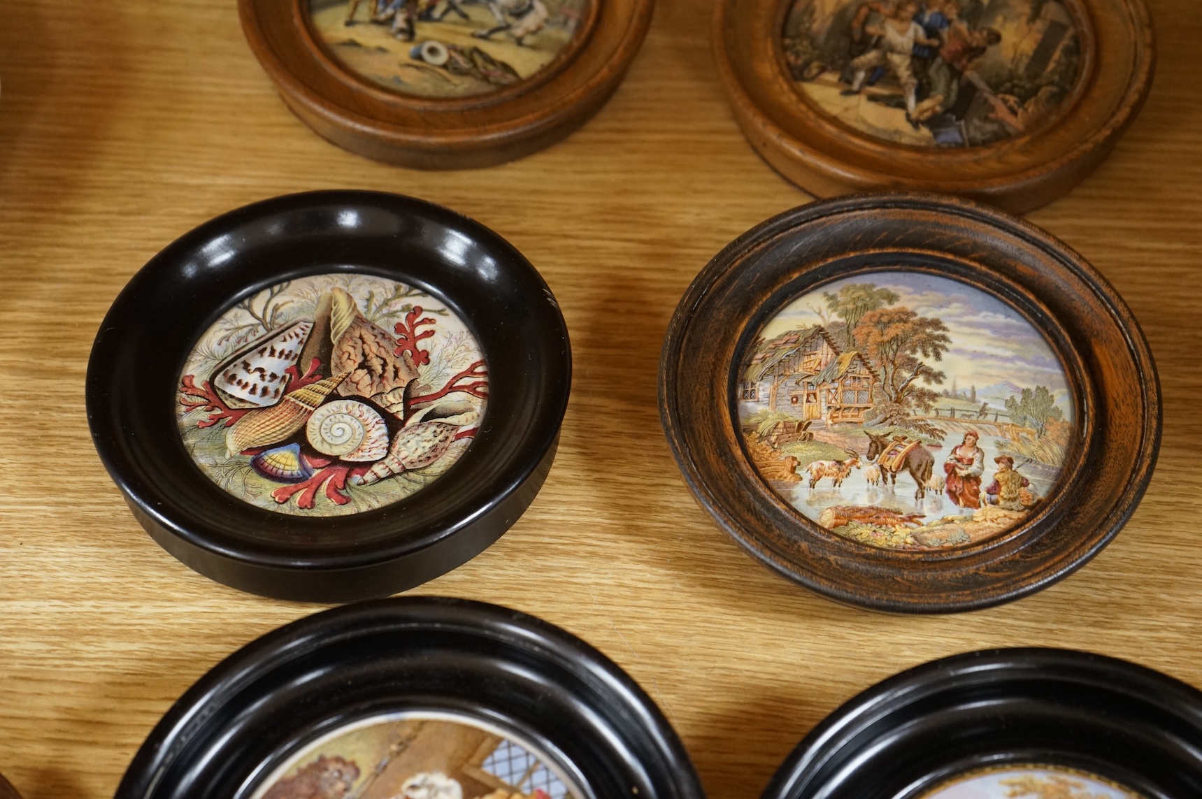 Ten various pot lids, including a rectangular shaped pot lid and frame; Wouvermann Pinx. 15cm wide not including frame.